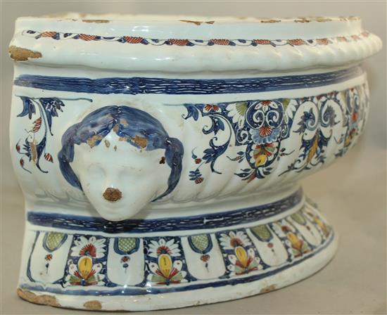 A Rouen faience pottery cistern, c.1720-1740, 53cm, restored